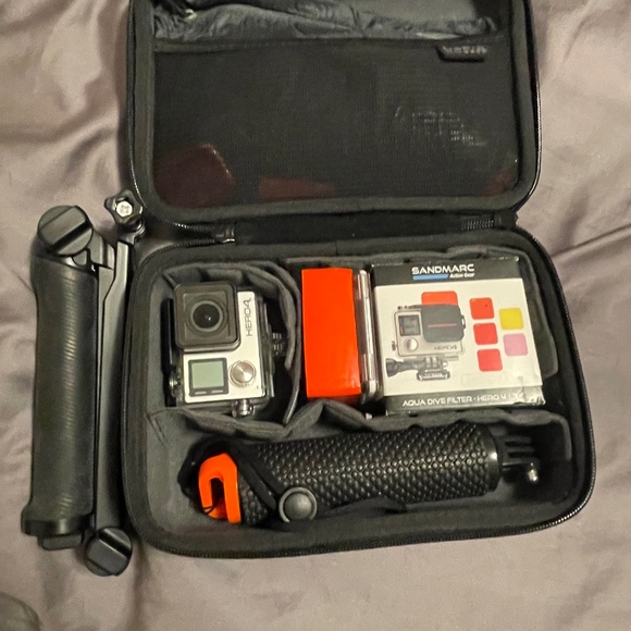 Go Pro Hero 4 with Various Accessories - Picture 1 of 3